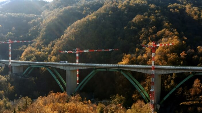 Europes-largest-ever-Potain-top-slewing-cranes-tackle-massive-Gravagna-viaduct-refurbishment-in-Italy-1.jpg