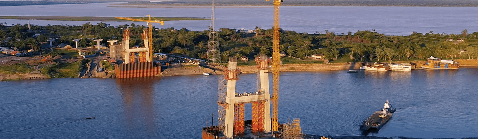 Potain-MC-310-K16-tower-crane-duo-erects-1410-ft-bridge-in-Perus-Amazon-01.png